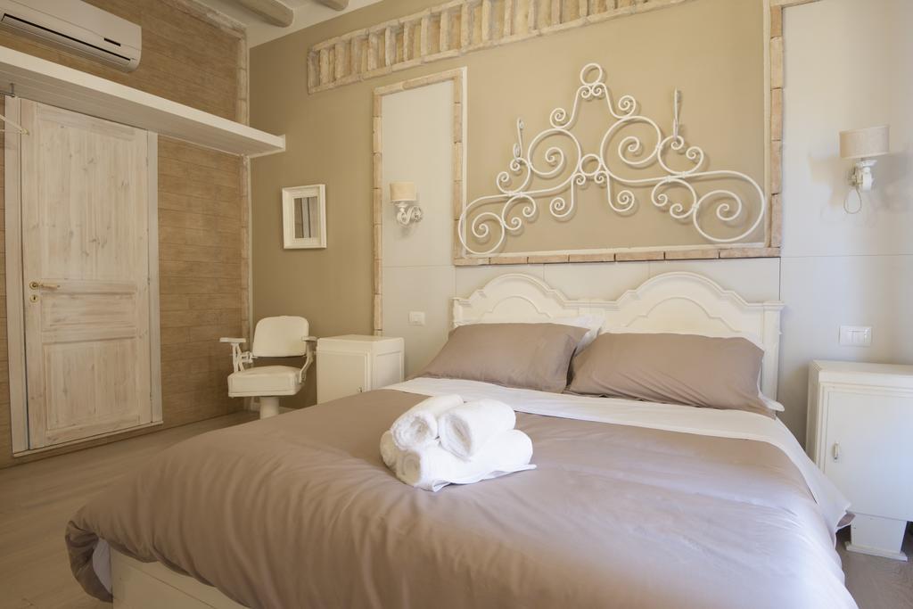 Cento Suites Cagliari Habitación foto